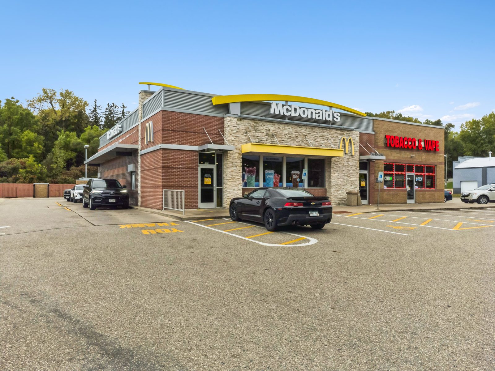 McDonald's and Tobacco & Vape retail center at 159-161 W Main St, Ellsworth, WI